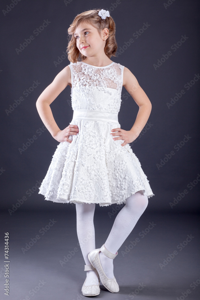 Naklejka premium Portrait of little girl in luxurious dress. Fashion photo