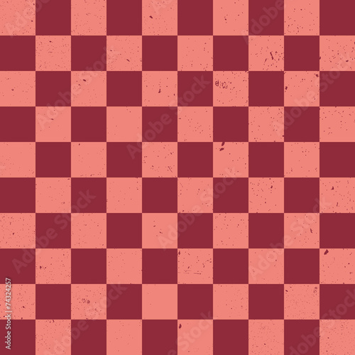 A red checkered vector background with grunge texture