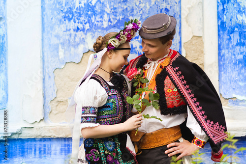 Couple in love in national folk costumes photo