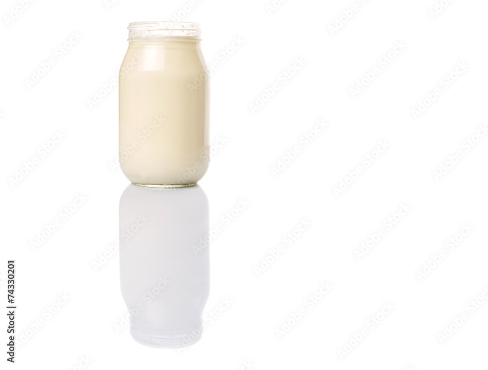 Mayonnaise in a jar over white background Mayonnaise in a jar over white background