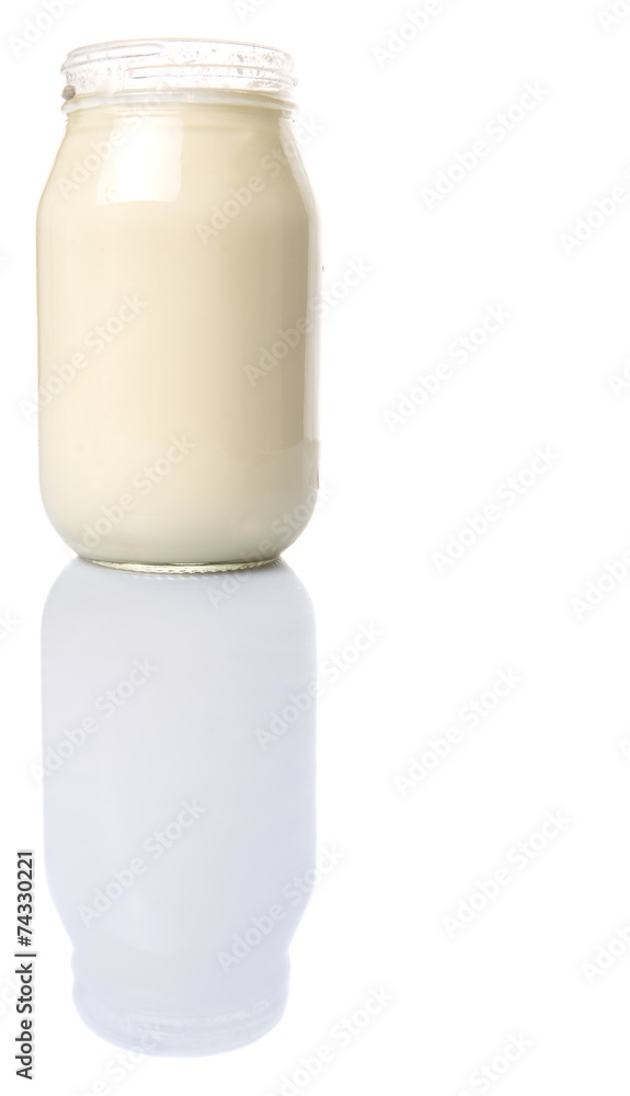 Mayonnaise in a jar over white background Mayonnaise in a jar over white background