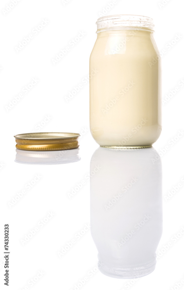 Mayonnaise in a jar over white background Mayonnaise in a jar over white background