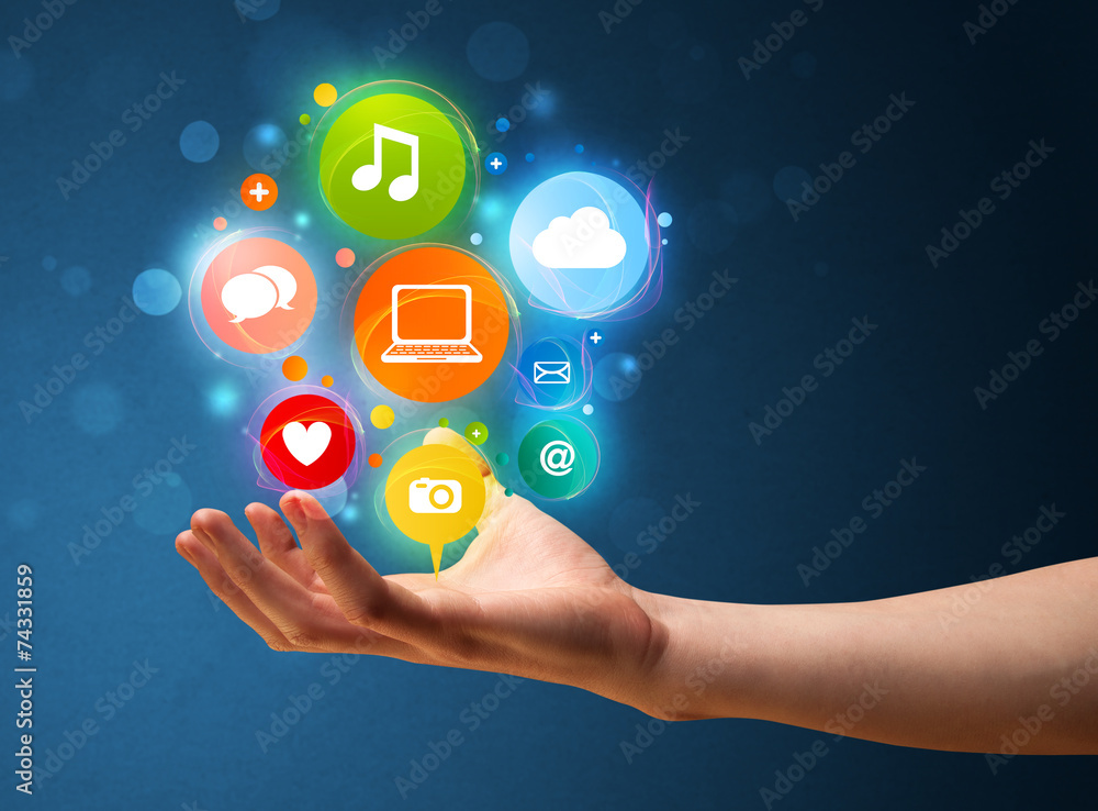Multimedia icons in the hand of a businessman Multimedia icons in the hand of a businessman