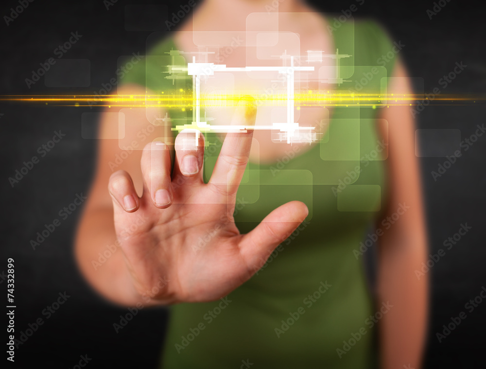 Young tech lady touching button with orange light beams concept