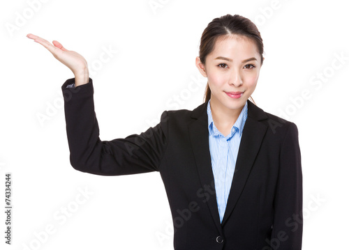 Businesswoman with hand presentation