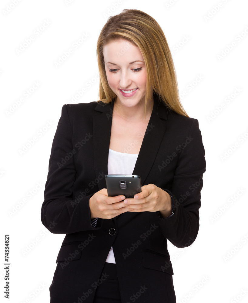 Businesswoman look at the mobile phone Businesswoman look at the mobile phone