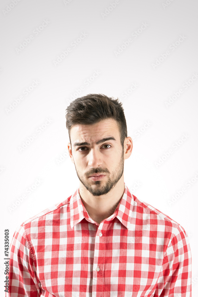 Fototapeta premium Skeptical bearded man portrait