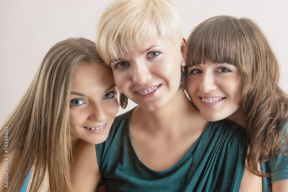 Portrait of Three Young Caucasian Girlfriends With Teeth Braces( Portrait of Three Young Caucasian Girlfriends With Teeth Braces(