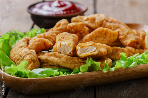 Εκτύπωση καμβά sticks breaded chicken with lemon