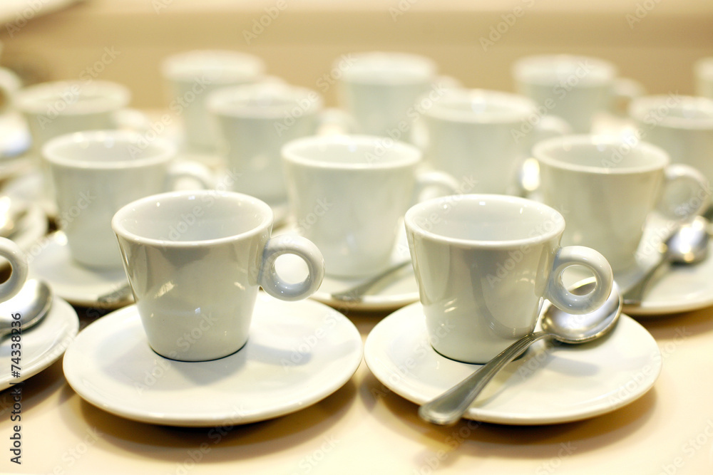 Coffee cups and saucers at an event Coffee cups and saucers at an event