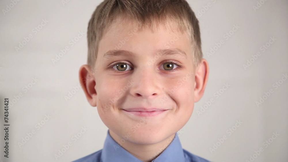 Portrait of a beautiful, caucasian boy on a black background Portrait of a beautiful, caucasian boy on a black background