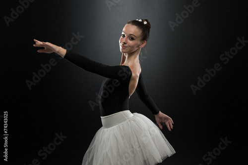 Woman Ballerina Ballet Dancer Dancing On Black Background