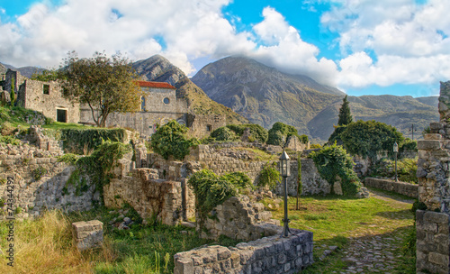 medieval town ruins in mountains photo