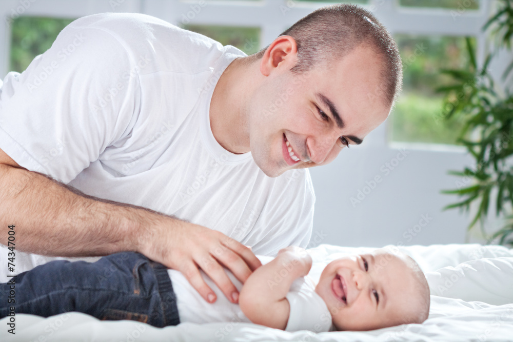 Happy father and son enjoy together and laughing