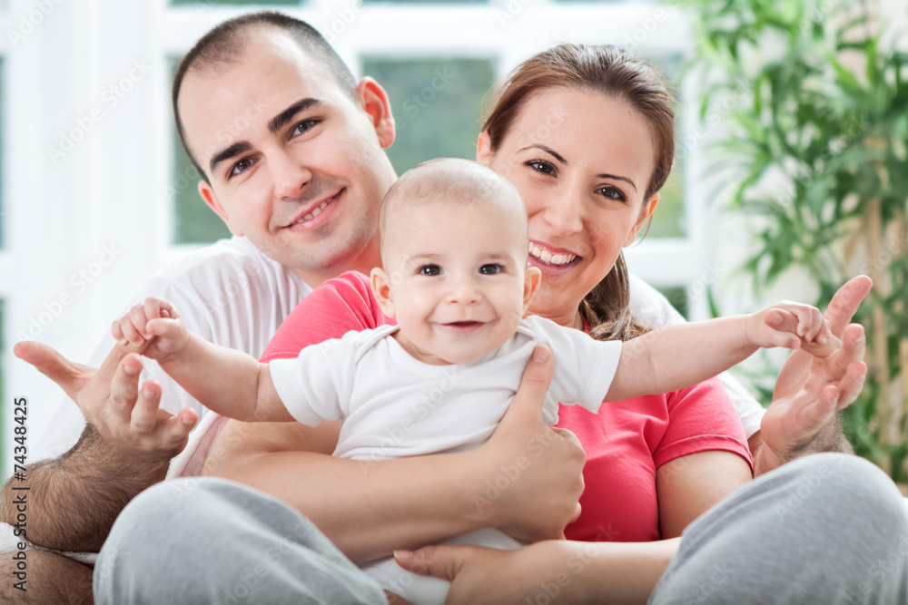 Beautiful smiling happy family enjoy at home Beautiful smiling happy family enjoy at home