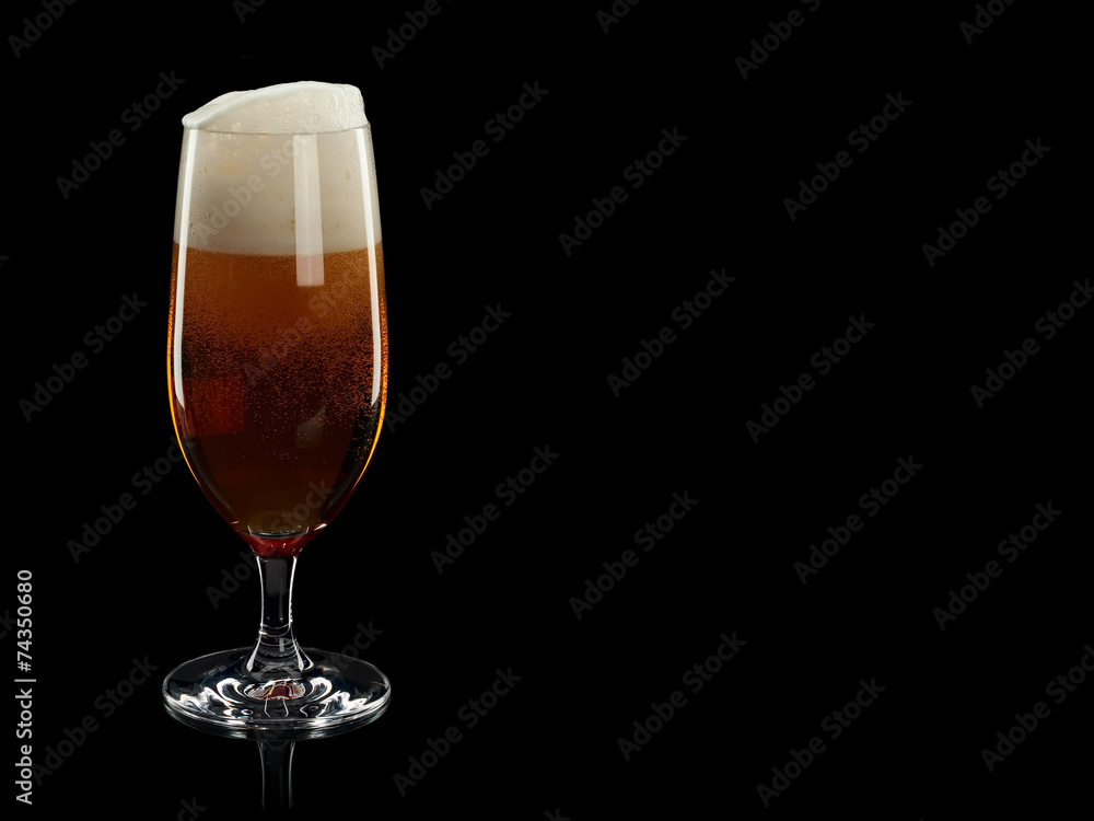 Glass with foamy beer
