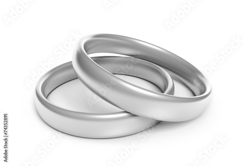 Two silver engagement or wedding rings for a couples wedding