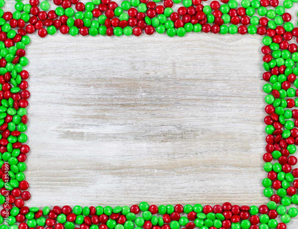 Red and Green candy border on wood Red and Green candy border on wood