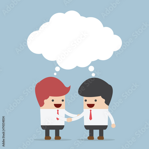 Businessmen shaking hands and blank speech