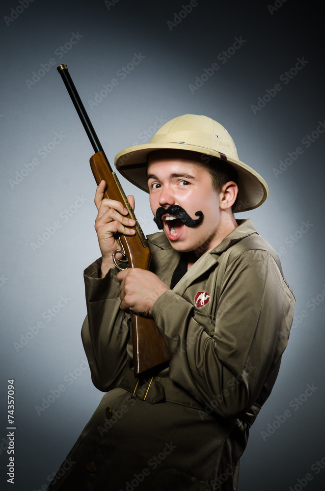 Man in safari hat in hunting concept Man in safari hat in hunting concept