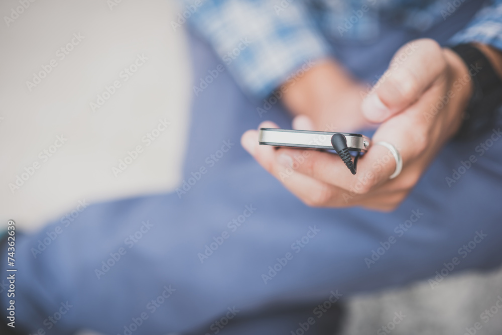 close up hand man using smartphone