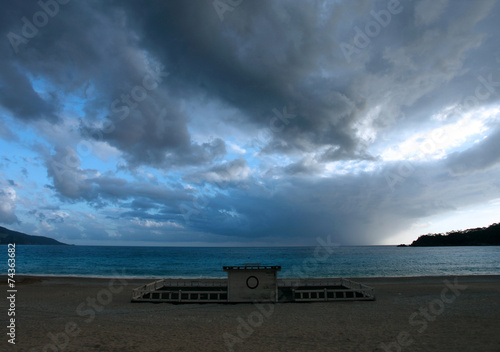 Fototapeta Naklejka Na Ścianę i Meble -  View of the sea and the beach of Oludeniz after rain