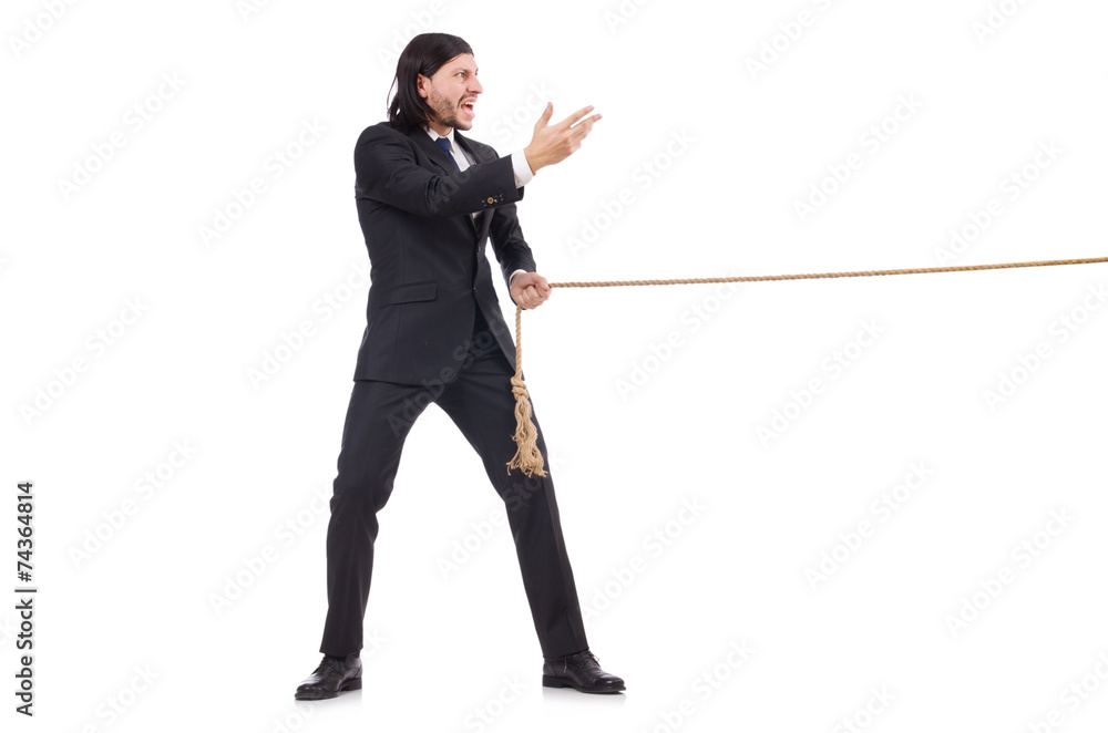 Young businessman pulling rope isolated on white Young businessman pulling rope isolated on white