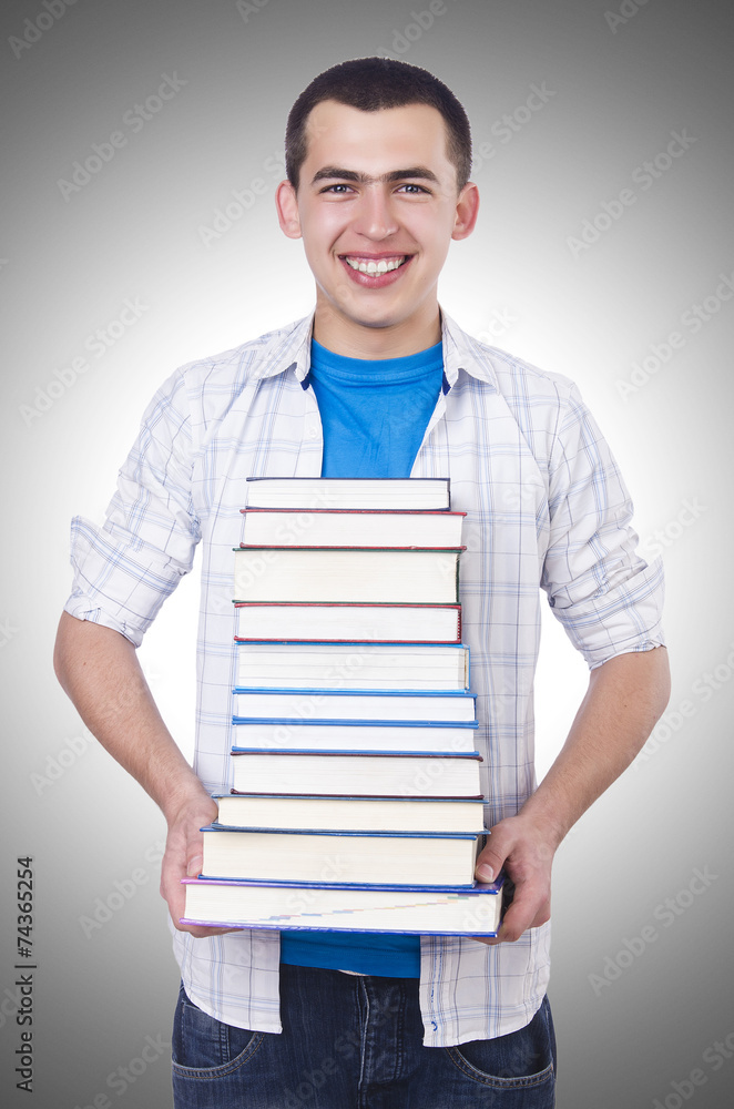 Student with lots of books on white Student with lots of books on white