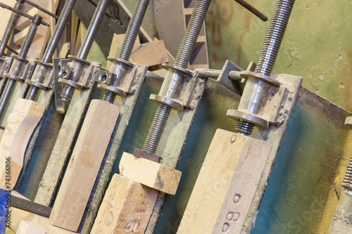 clamps holding workpiece gluing