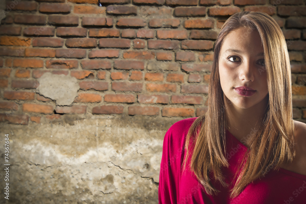 portrait of a young girl with serious expression portrait of a young girl with serious expression