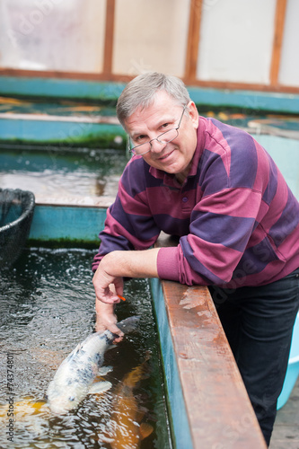 Cuadro en lienzo Vet with koi fish