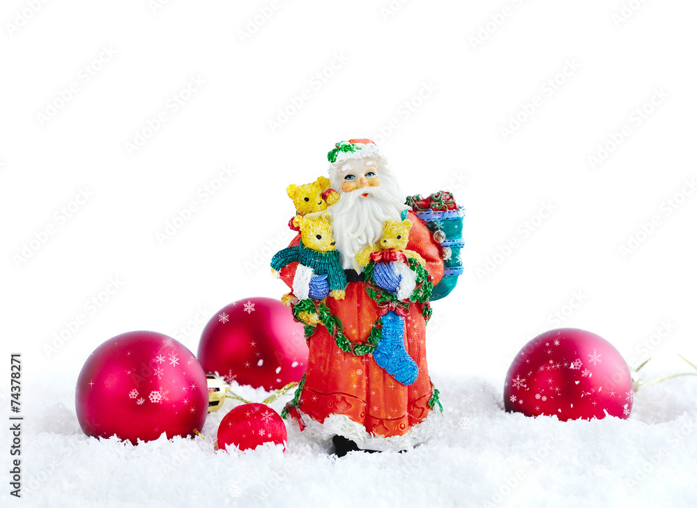 Santa Claus with Christmas decorations on snow