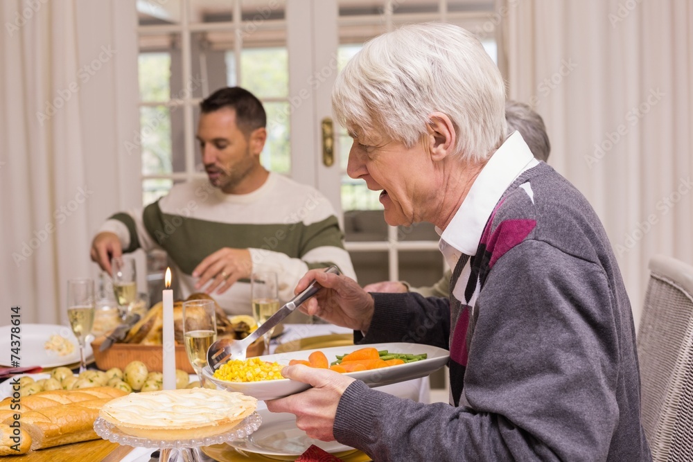 Family having christmas dinner together Family having christmas dinner together