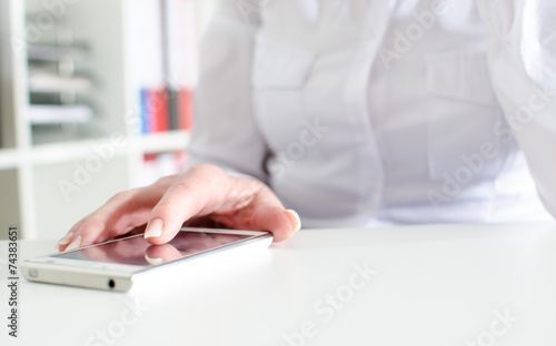 Businesswoman using a smartphone