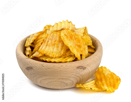 potato chips in a wooden bowl photo