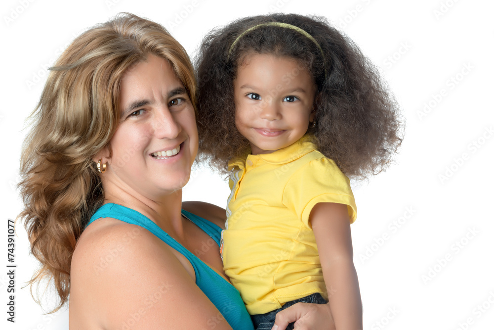 Adult woman carrying a cute afroamerican girl Adult woman carrying a cute afroamerican girl