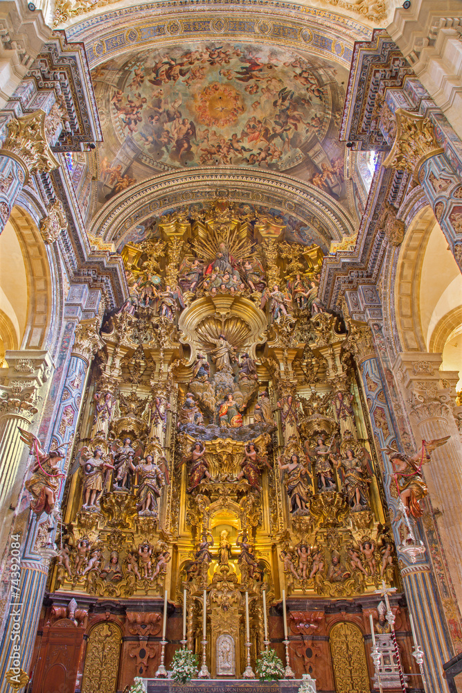 Seville - The main altar in baroque Church of El Salvador