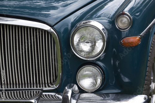 Closeup of Chrome Grille and Lights of Restored Classic Car