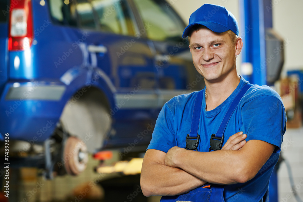 Repairman auto mechanic at work Repairman auto mechanic at work