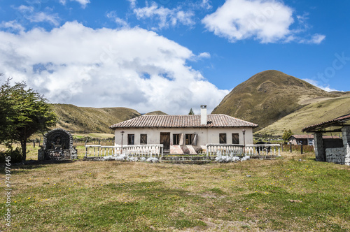 Ecuadorian country house in the Andes mountains. Tourism, travel, no people, south america, sky, clouds, rural, countryside, rustic, architecture, nature, traditional, landscape, highlands, adventure