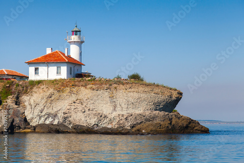 White lighthouse with red light on St. Anastasia Island