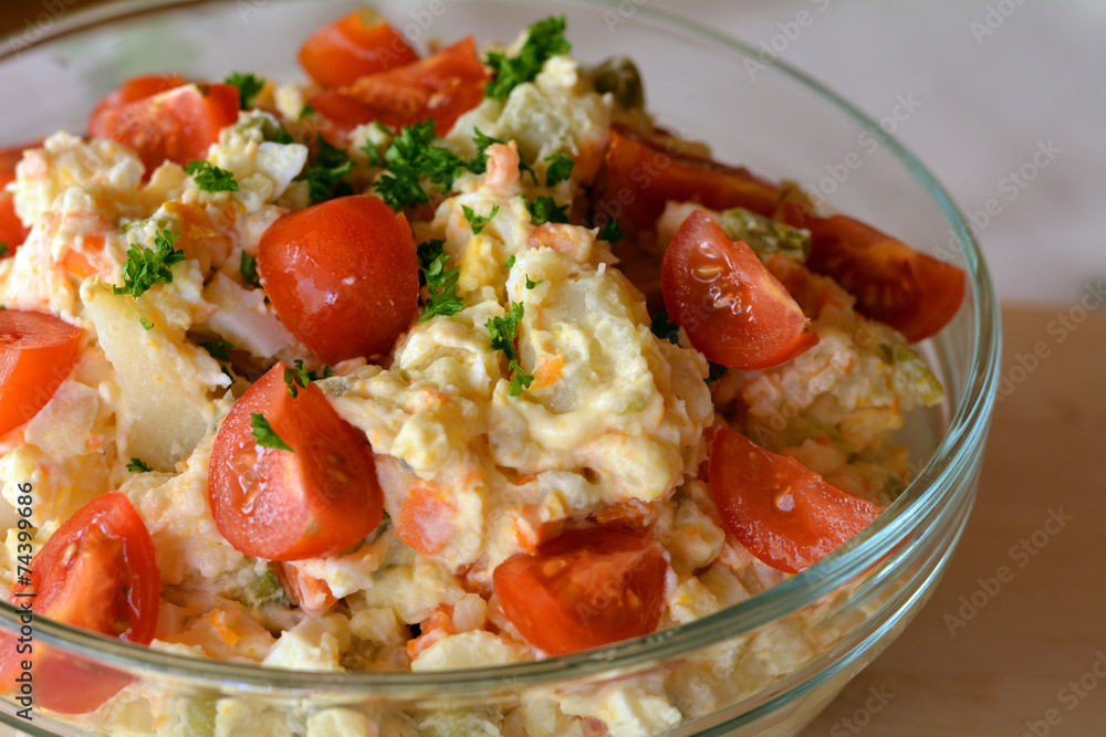 Homemade Potato Salad with Eggs and Pickles In Glass Bowl Homemade Potato Salad with Eggs and Pickles In Glass Bowl