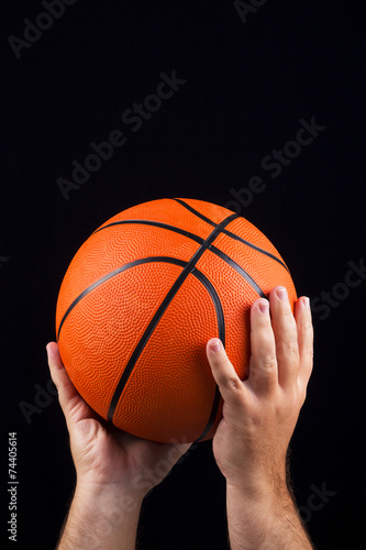 Basketball ball in male hands © aleksandarfilip