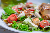 Closeup of cesar salad with vegetables