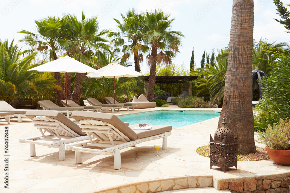Fototapeta premium Luxury Hotel Swimming Pool With Loungers