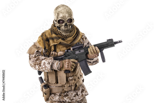 Unrecognizable criminal holding a rifle