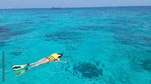 Woman snorkeling in the sea Thailand