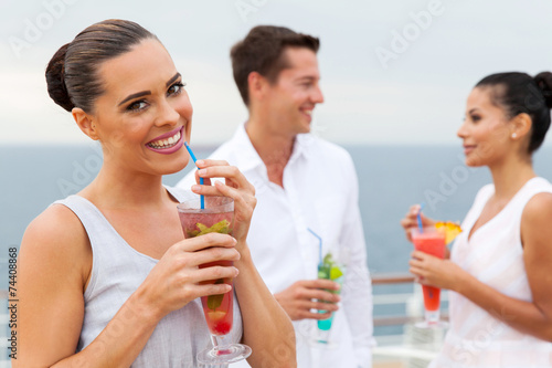 woman drinking tropical juice