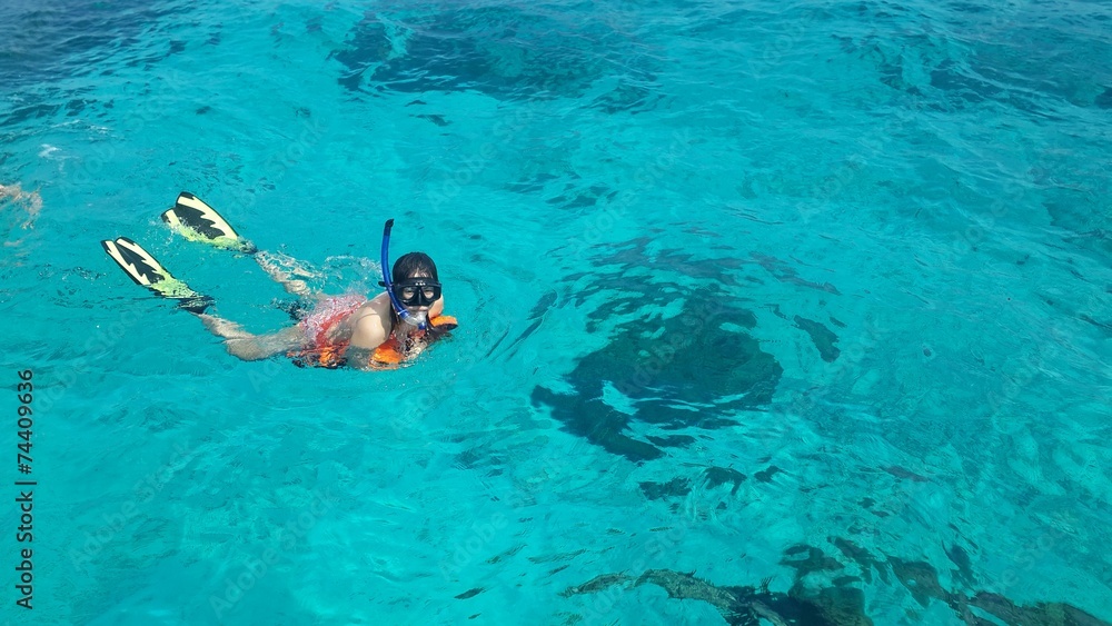 Woman snorkeling in the sea Thailand
