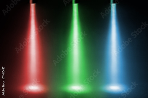 three color spotlights on stage